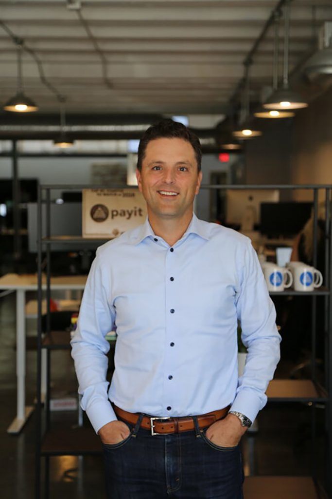 Blog cover for CEO John Thomson in PayIt Kansas City Office